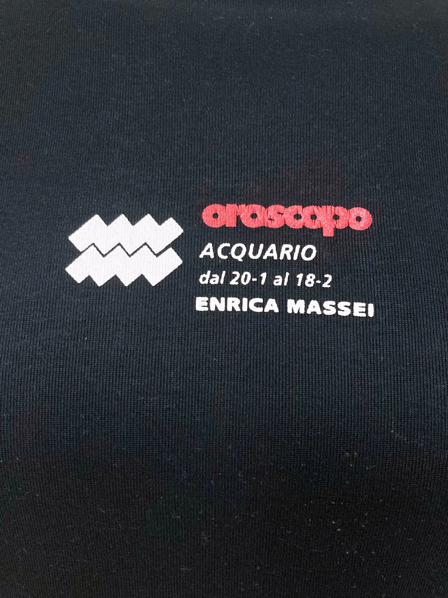 Enrica Massei black cotton oroscopo acquario aquarius horoscope logo baby tee